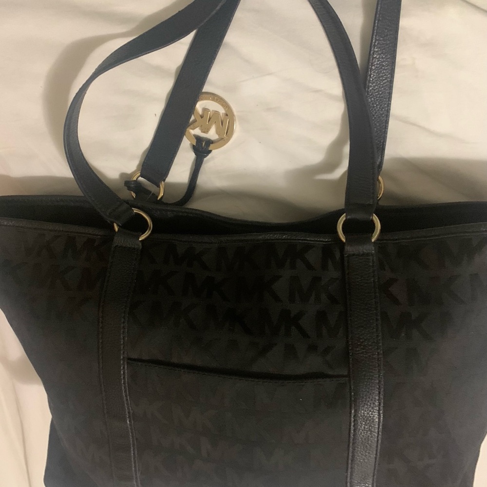 Michael Kors Black Tote with Textured Design and Gold Accents